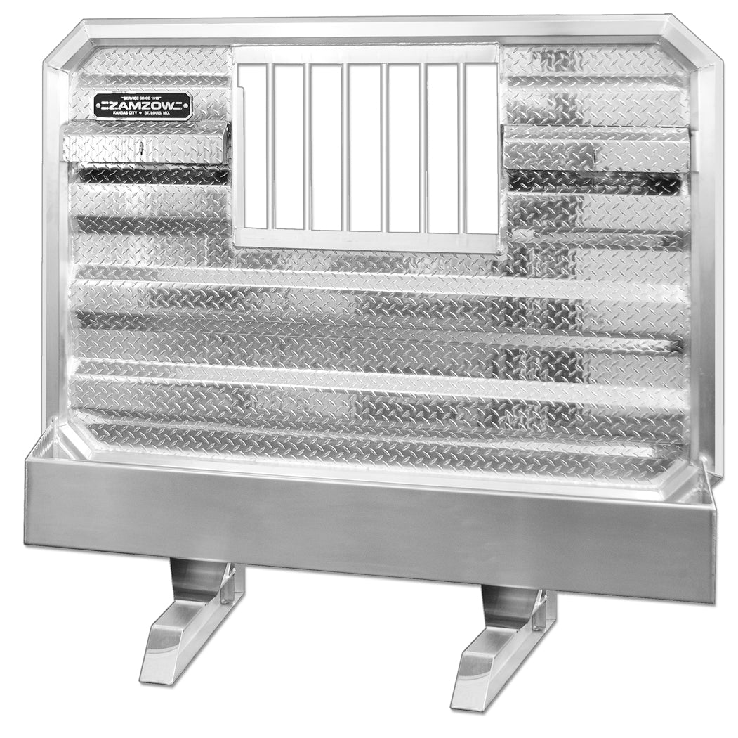Polished aluminum diamond-plate truck headboard with an integrated rectangular rear window, mounted on two metal support legs. The headboard features a reflective textured surface, angled corners, and a visible Zamzow brand label on the upper left, shown against a white background.
