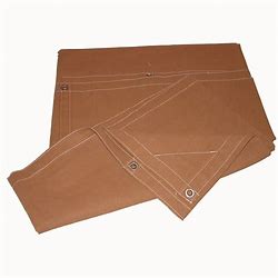 Stack of brown fire-retardant canvas tarps with reinforced edges and metal grommets, partially folded and displayed on a white background.